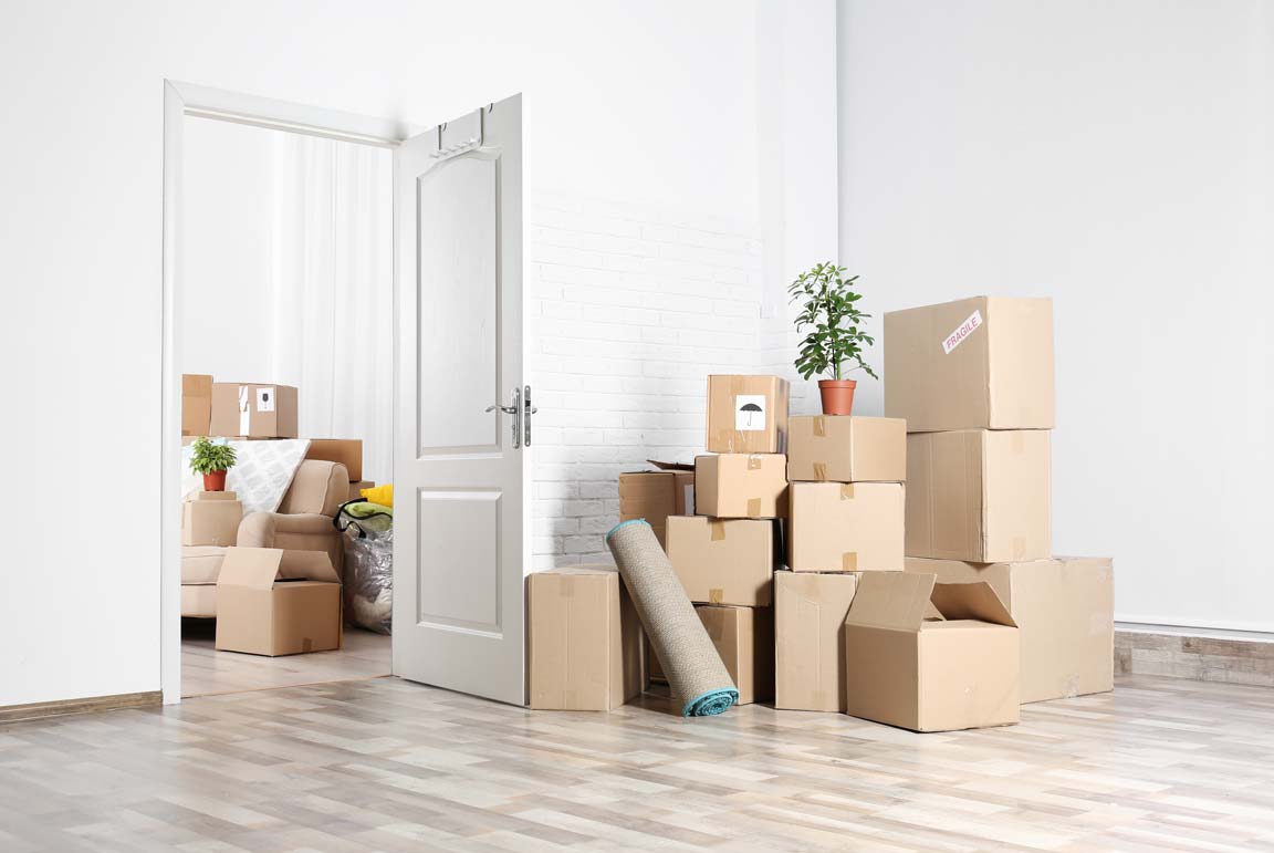 Image of a packed up boxes ready to move in an apartment. Trend Moving and Storage offers apartment moving services in NH & FL.