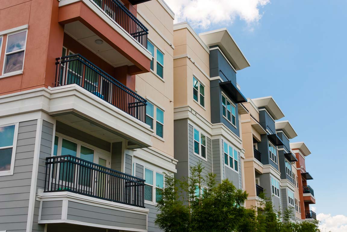 Image of the outside of an apartment building. Trend Moving and Storage offers apartment moving services in NH & FL.